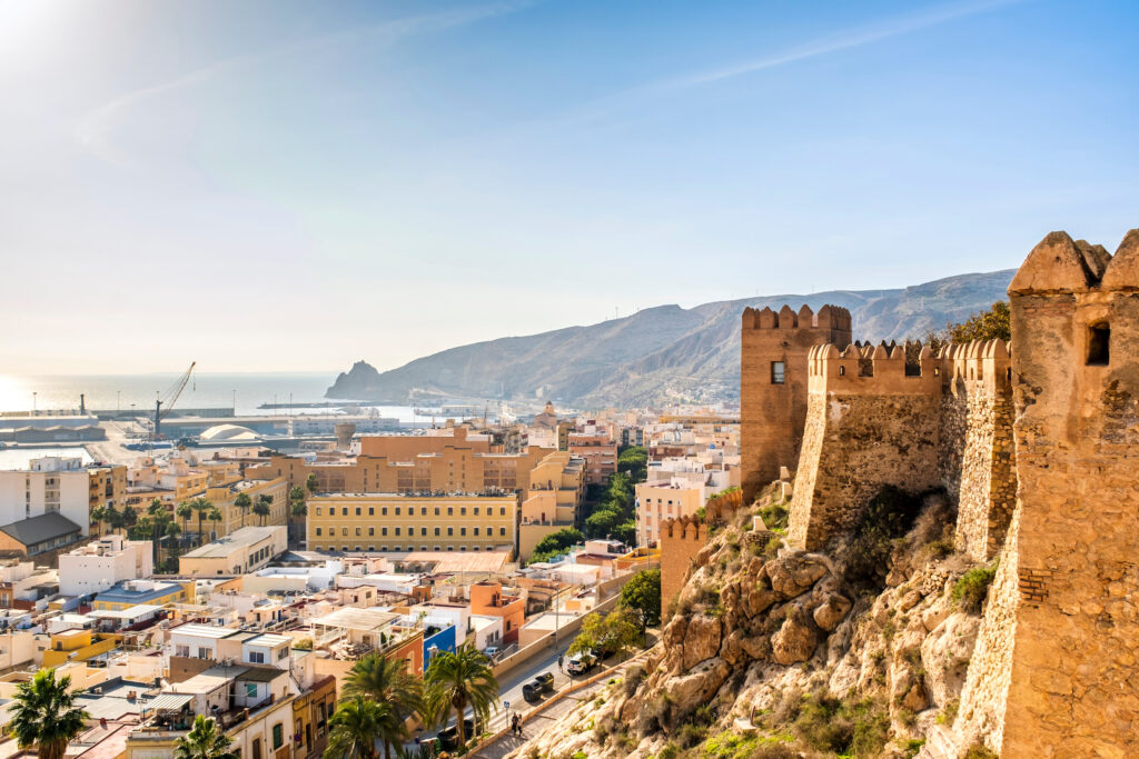 Great viw of the Alcazaba of Almeria, a fortified complex in southern Spain, constrution of defensive citadel with walls, towers, squares, houses and mosque. Almeria, Andalusia, Spain.